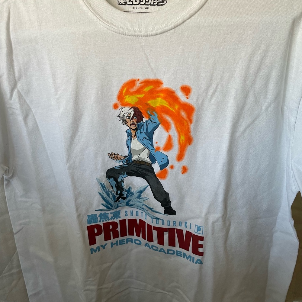 Primitive Blue and White Short Sleeve Tee with Energetic Graphic